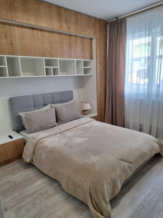 Apartament 2 camere (utilat-mobilat), situat în zona Coresi