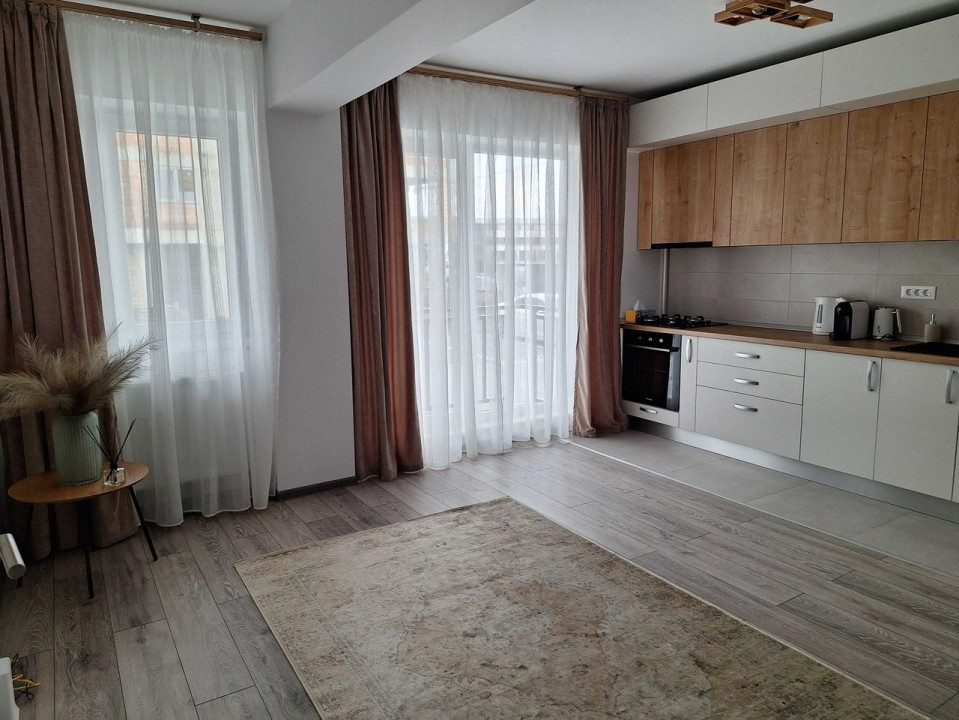 Apartament 2 camere (utilat-mobilat), situat în zona Coresi